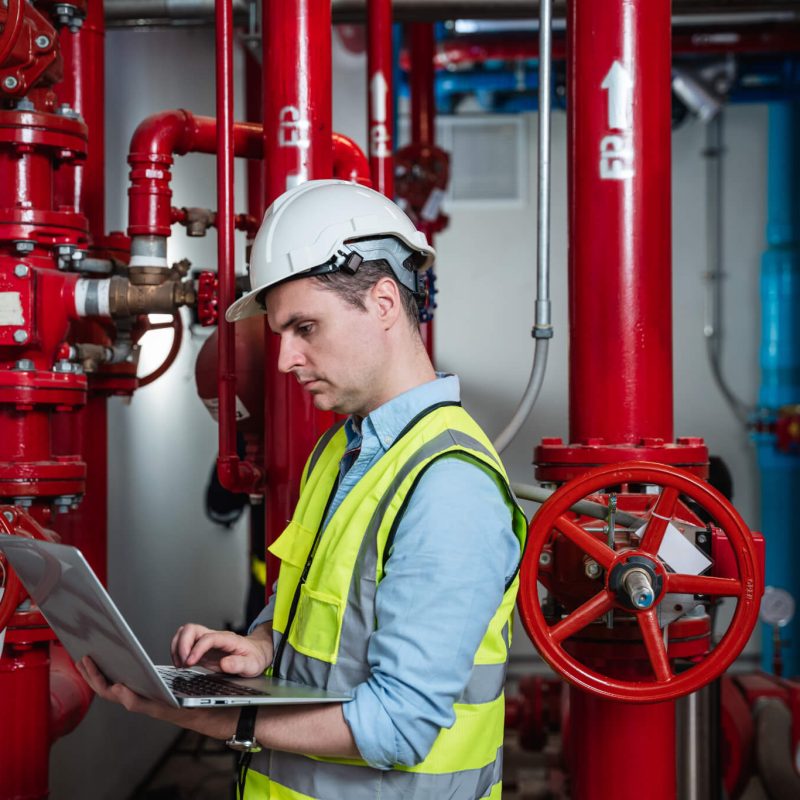 engineers-inspecting-the-inside-plumbing-and-water-valves-of-an-industrial-facility-.jpg